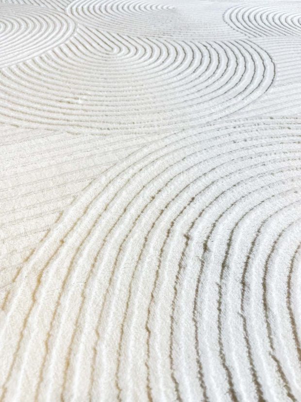 שטיח חריטות לבן