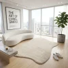 שטיח SHAPES אמורפי דגם ZEN 01 D.STONE, high-rise apartment with a city view, lifestyle props, Dreamy Morning Glow.