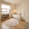 שטיח ילדים בונבון בז' חלק עגול, Scandi Neutrals, lifestyle props, Soft Window Light.