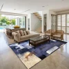 שטיח לוקה SALE LUCCA 206, Luxurious open-plan living room in a modern Israeli villa, featuring a huge kitchen with a mass...